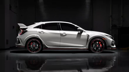 White Honda Civic Type R with red accents reflected on a glossy floor, showcased against a dark industrial background in a high-definition PC desktop wallpaper.