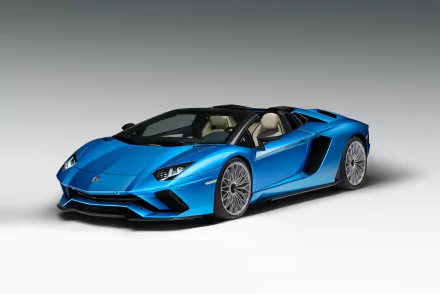 HD desktop wallpaper featuring a sleek blue Lamborghini Aventador S supercar showcased against a neutral background.