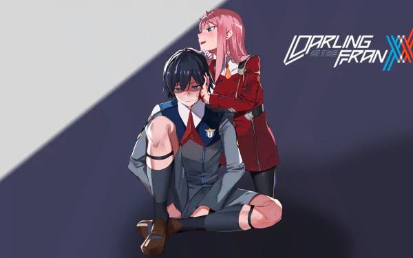 HD desktop wallpaper featuring anime characters Hiro and Zero Two from Darling in the FranXX. Hiro has black hair and sits on the floor, while Zero Two with pink hair stands behind him, smiling.