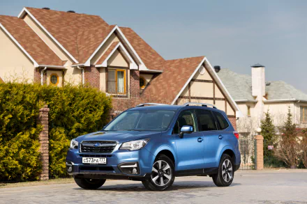 4K Ultra HD PC desktop wallpaper of a blue Subaru Forester SUV parked in front of suburban houses, a Subaru car/vehicle framed against a clear sky.