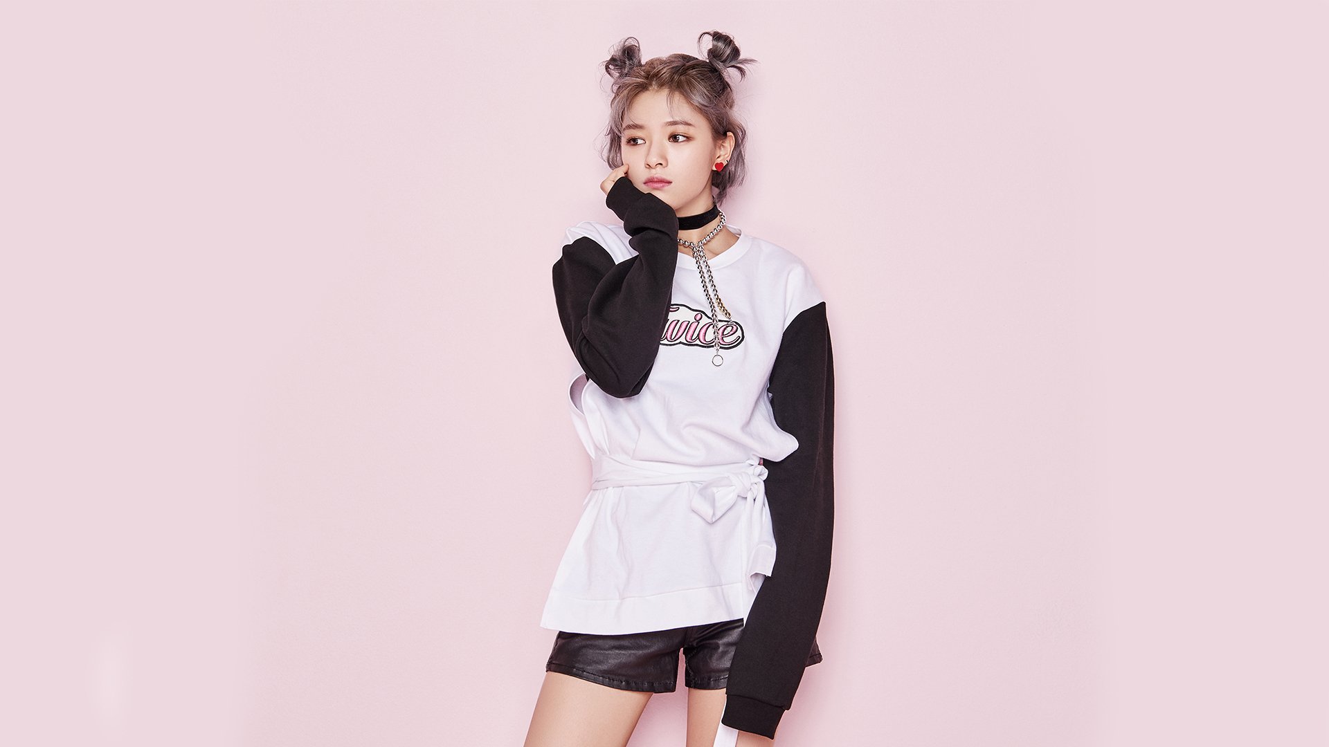 HD desktop wallpaper of Jeongyeon from K-pop group Twice, featuring her short purple hair, brown eyes, and casual black and white outfit.