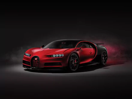 HD wallpaper featuring the sleek and powerful Bugatti Chiron supercar, showcased in a dramatic red and black color scheme against a dark background.