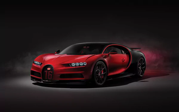 HD wallpaper featuring the sleek and powerful Bugatti Chiron supercar, showcased in a dramatic red and black color scheme against a dark background.