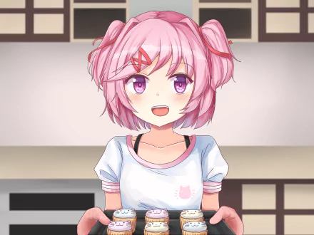 HD desktop wallpaper featuring Natsuki from the video game Doki Doki Literature Club!, standing in a kitchen with a cheerful expression.