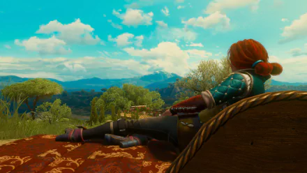 Triss Merigold from The Witcher 3: Wild Hunt relaxes outdoors in a vibrant 4K Ultra HD PC desktop wallpaper showing a lush, expansive landscape under a bright sky.