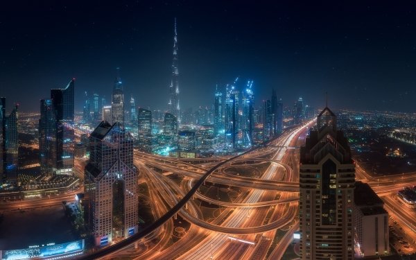 Man Made Dubai Cities United Arab Emirates City Night Light Building Skyscraper Highway HD Wallpaper | Background Image