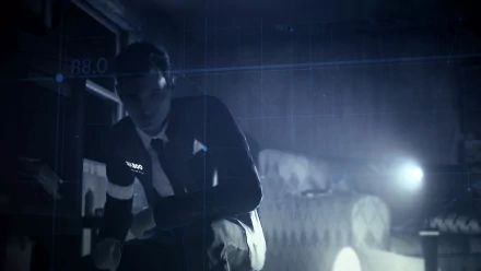 Connor from the video game Detroit: Become Human is shown in a dimly lit room. This HD desktop wallpaper captures a tense moment with Connor in focus, the background blurred for dramatic effect.