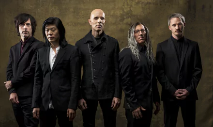HD desktop wallpaper of the band A Perfect Circle, featuring the members lined up against a textured backdrop.
