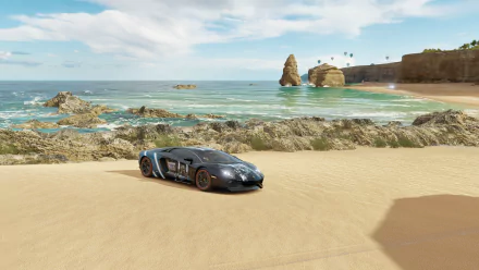 Forza Horizon 3 video game HD PC desktop wallpaper: black supercar on a sunlit sandy beach with turquoise water, rocky coastline and cliffs under a bright blue sky.