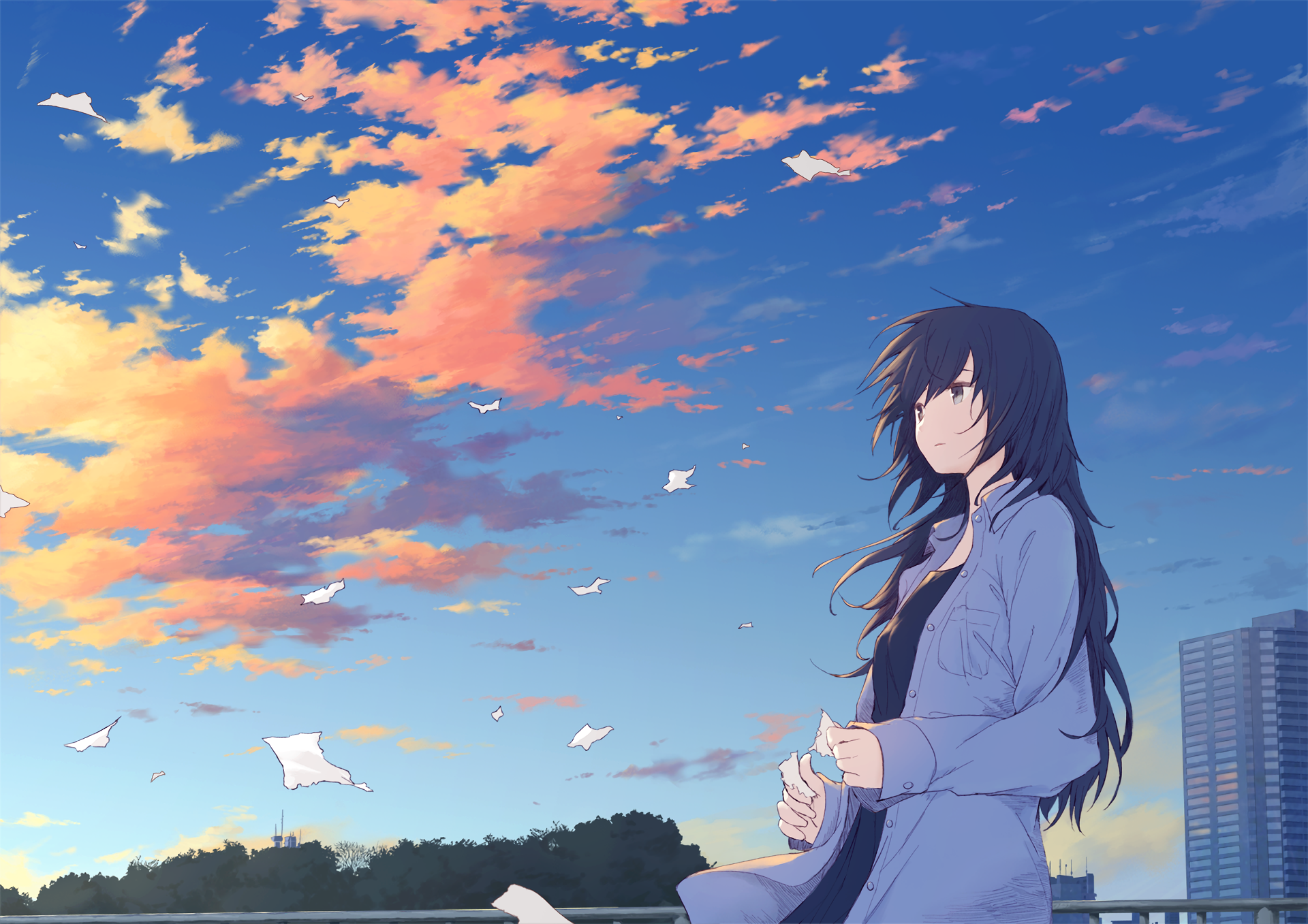 HD anime desktop wallpaper featuring an original artwork of a long-haired character in front of a vibrant sunset sky with scattered clouds and flying papers. A serene scene with a cityscape in the background.