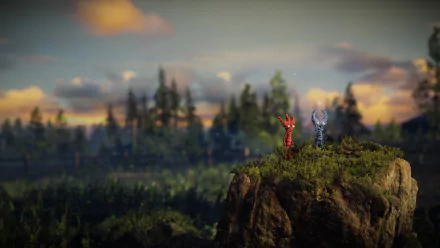 HD desktop wallpaper of two characters from Unravel Two standing on a cliff with a scenic forest backdrop at dusk.