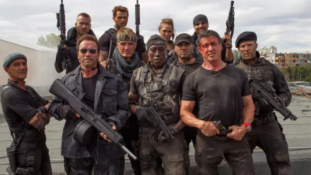Group of armed action stars from The Expendables 3 on a rooftop - 4K Ultra HD PC desktop wallpaper