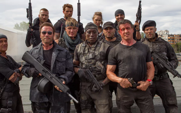 Group of armed action stars from The Expendables 3 on a rooftop - 4K Ultra HD PC desktop wallpaper