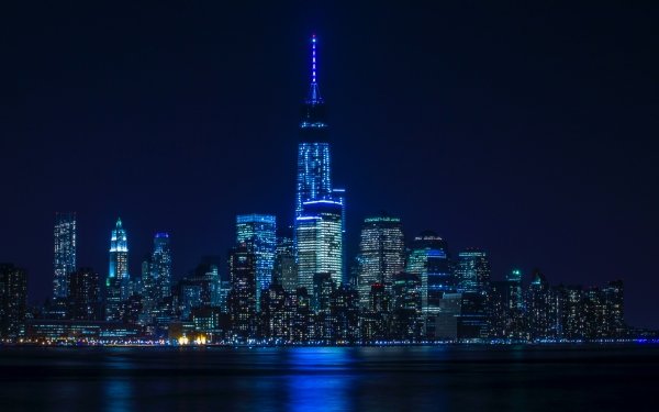 Man Made Manhattan Cities United States City Blue Night Skyscraper Architecture Building New York HD Wallpaper | Background Image