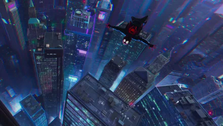 HD wallpaper featuring a scene from Spider-Man: Into The Spider-Verse with Spider-Man diving through a vibrant cityscape at night.