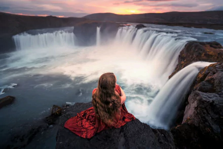  Girl Sitting on Rock at Godafoss Waterfall