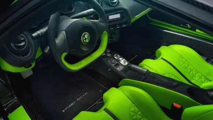 Interior of an Alfa Romeo 4C showing neon-green racing seats, steering wheel and center console — 4K Ultra HD PC desktop wallpaper and background.