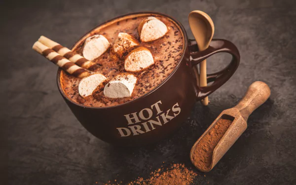 HD desktop wallpaper featuring a still life of a cup of hot chocolate topped with marshmallows and wafer sticks, accompanied by a scoop of cocoa powder.