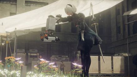YoRHa No.2 Type B from NieR: Automata interacting with a pod in a serene, flower-filled setting. This HD desktop wallpaper captures a moment from the video game.