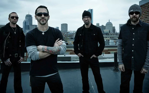 HD desktop wallpaper featuring Shinedown with four members standing confidently on a rooftop against a city skyline background.