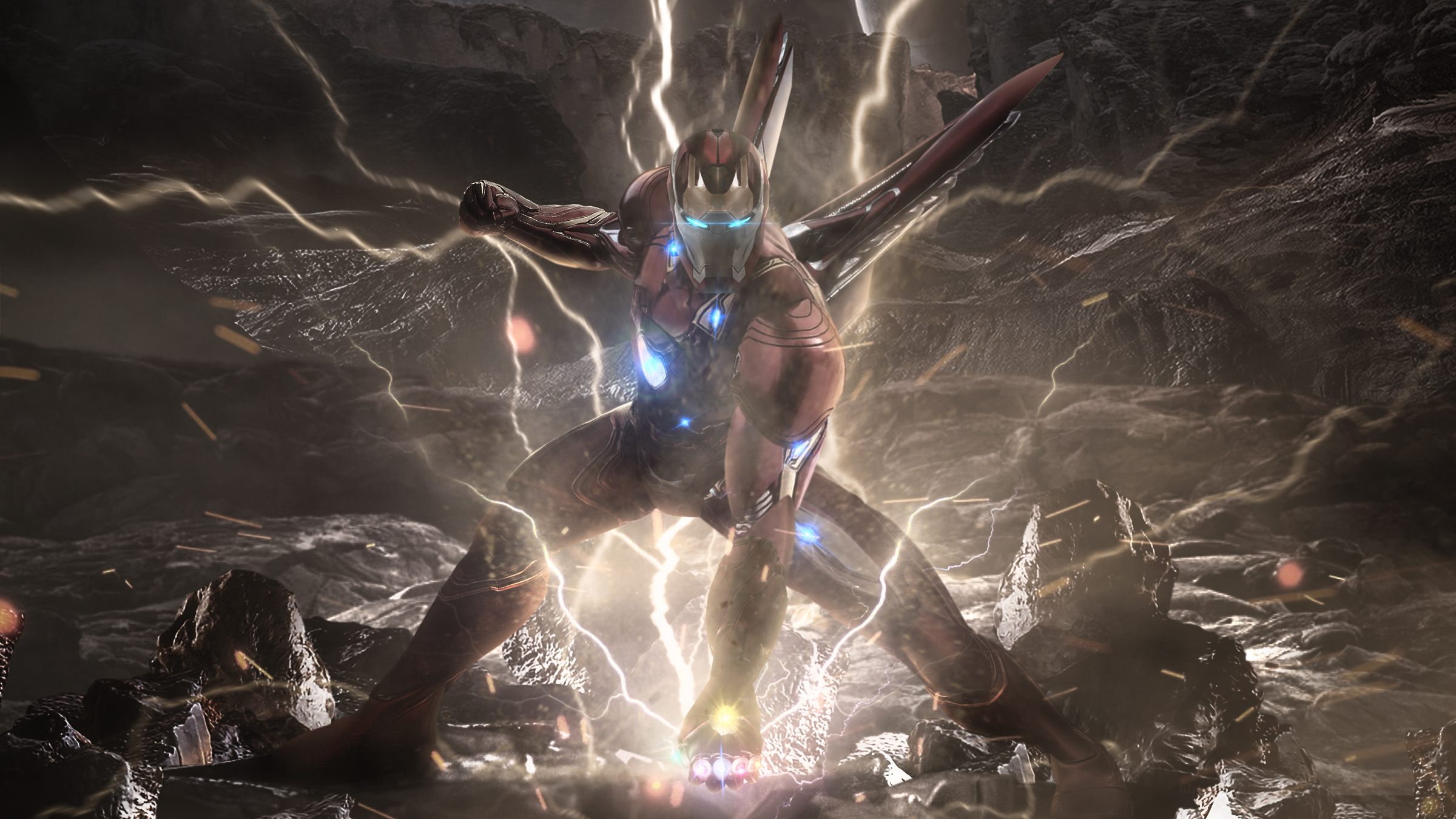 HD desktop wallpaper featuring Tony Stark as Iron Man from Avengers Endgame, wearing the Infinity Gauntlet amidst a dynamic scene of light and sparks, showcasing his superhero armor.