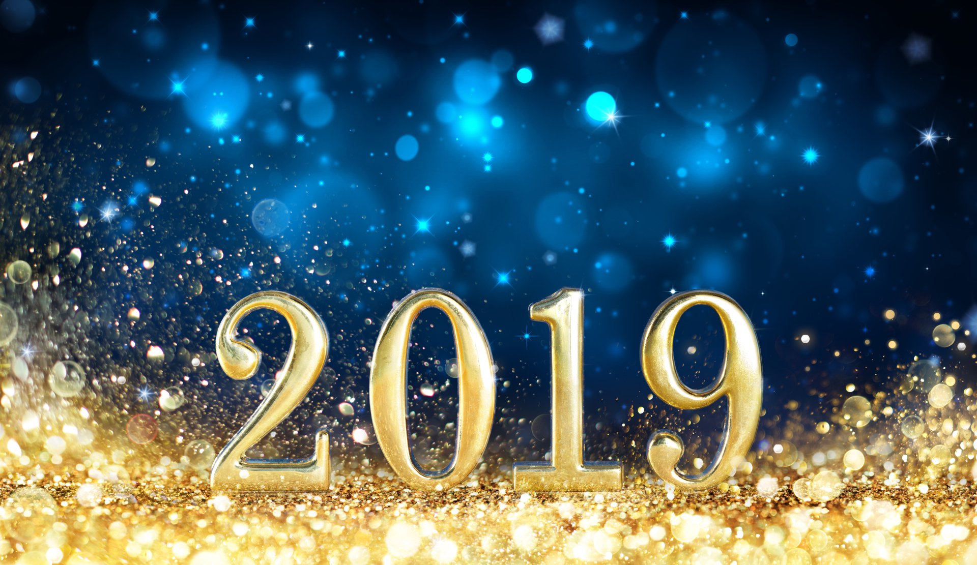 2019 in gold numbers with sparkling bokeh lights and festive holiday background in 8K Ultra HD resolution for PC desktop wallpaper.