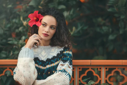  Woman with a hibiscus flower in her hair by Jayma Javier