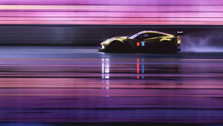 Side view of a Chevrolet Corvette racing at high speed, shown in motion blur with vibrant pink and purple lighting, featured as a 4K Ultra HD PC desktop wallpaper.