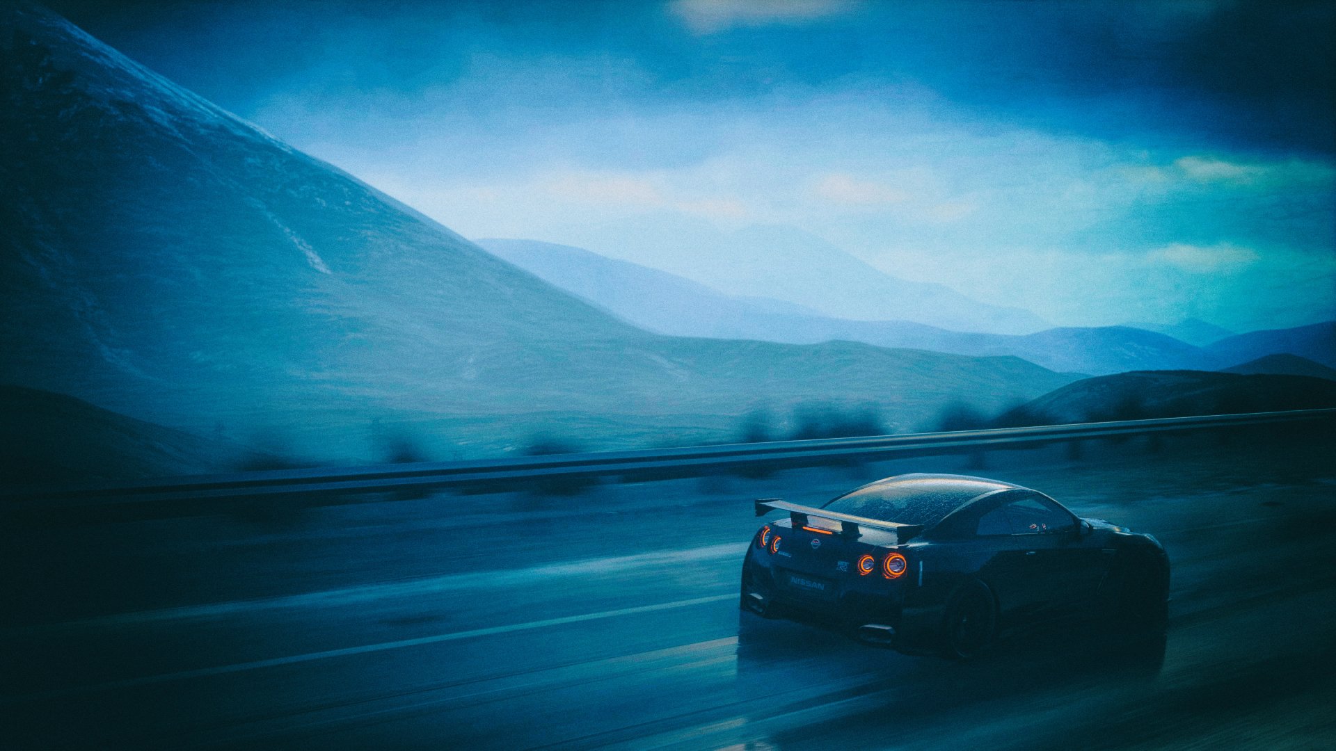 Nissan GT-R racing through misty mountains in a dynamic scene from the Driveclub video game, showcased as a 4K Ultra HD PC desktop wallpaper.