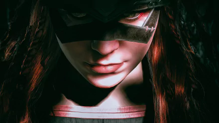 Close-up HD desktop wallpaper of Aloy from the Horizon Zero Dawn video game, showcasing her intense expression and detailed face partially shadowed.