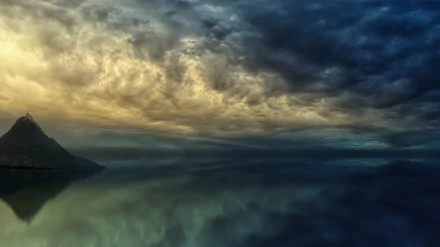 4K Ultra HD wallpaper of a peaceful ocean reflecting dramatic clouds above a distant island, showcasing serene nature.