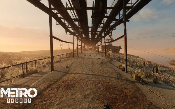 HD Metro Exodus desktop wallpaper depicting a desolate, apocalyptic landscape under an abandoned industrial structure during sunset.