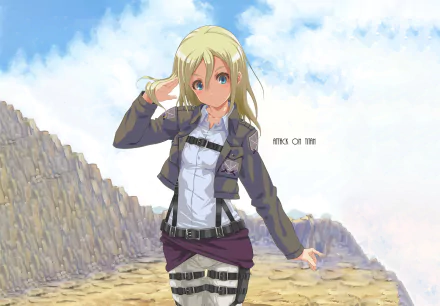 HD desktop wallpaper featuring Historia Reiss from the anime Attack on Titan, standing on rocky terrain under a bright blue sky.