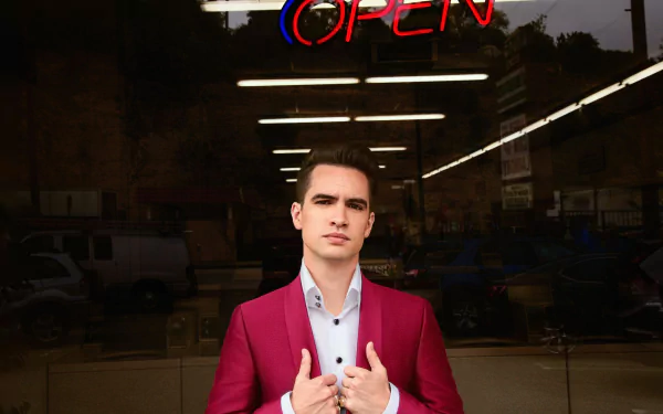 HD desktop wallpaper featuring a member of Panic! at the Disco standing before a neon OPEN sign, exuding a cool vibe.